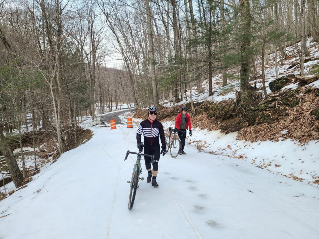 Walking bikes on icy snow