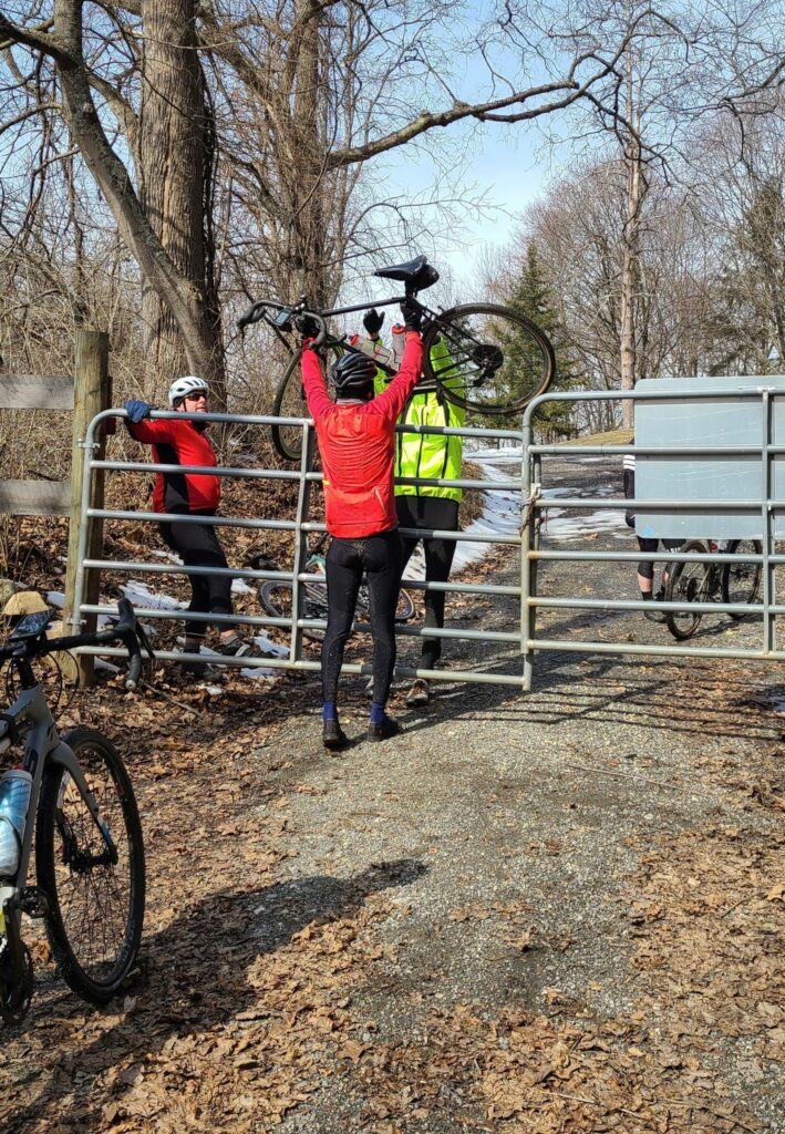 Lifting bikes over a gate